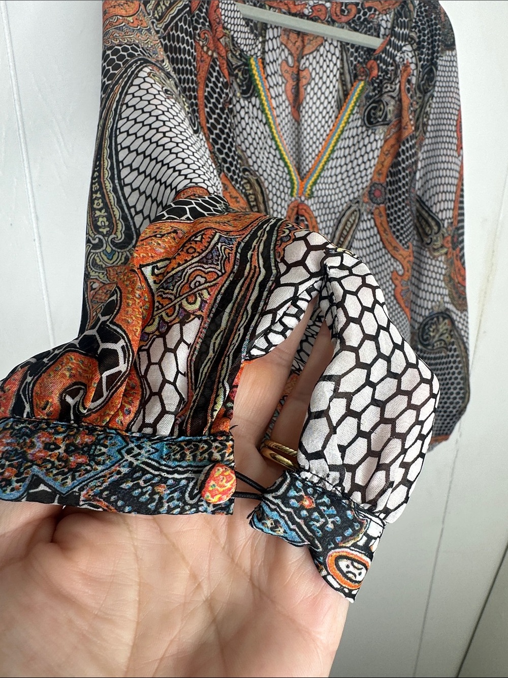 Sheer Paisley V-Neck Blouse in Orange and Black - Picture 2 of 6